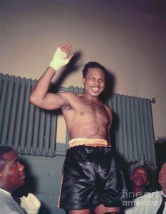 Best Boxers Of All Time! Ranking the Top 10 Pound-for-Pound fighters Ever 1 Archie Moore Smiling