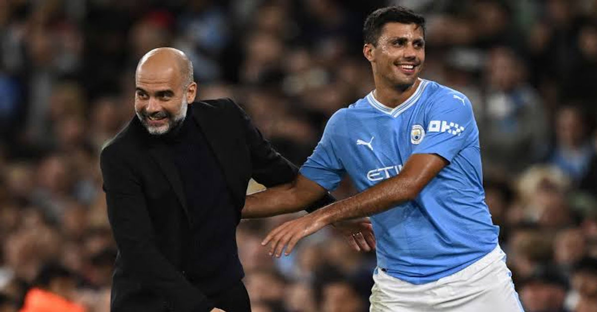 Pep Guardiola and Rodri