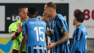 'From Villain to Hero' - Super Eagles star decorated in the wake of a disastrous outing in Belgium 1 Raphael Onyedika receives a red card against Sporting Charleroi. (X)
